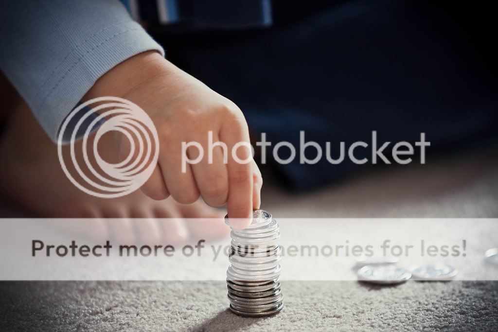 IMAGE: http://i378.photobucket.com/albums/oo230/alan_u1971/Webpics/coinstack1024.jpg